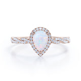 Twisted 1.45 Ct Pear Cut Lab Created Opal Engagement Ring
