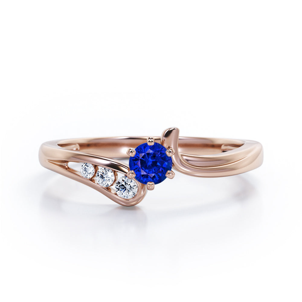 Curved Band - Six Prongs 0.5 carat Round Blue Sapphire and Moissanite Artistic Engagement Ring in Rose Gold