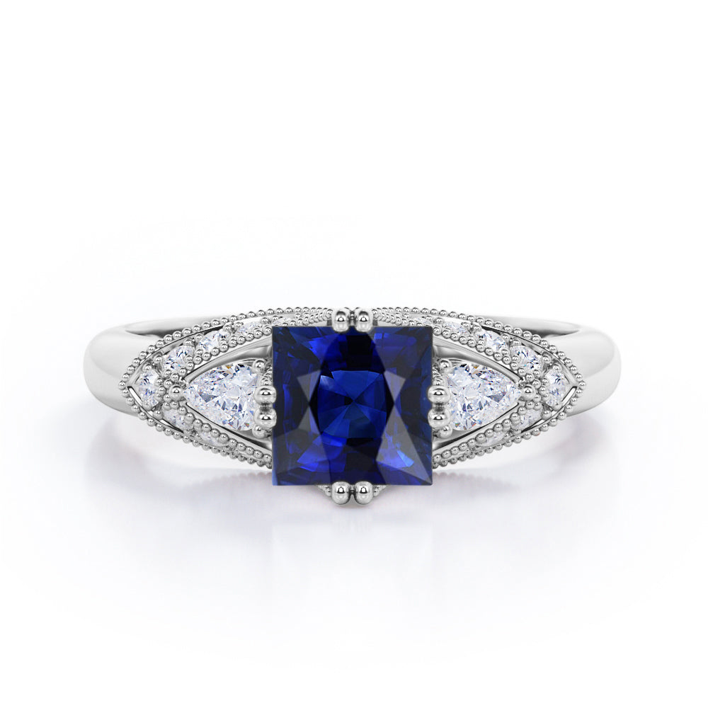 Vintage Eight Prongs 1.30 Carat Princess Cut Sapphire And Diamond Marquise Framed Beaded Engagement Ring In Rose Gold