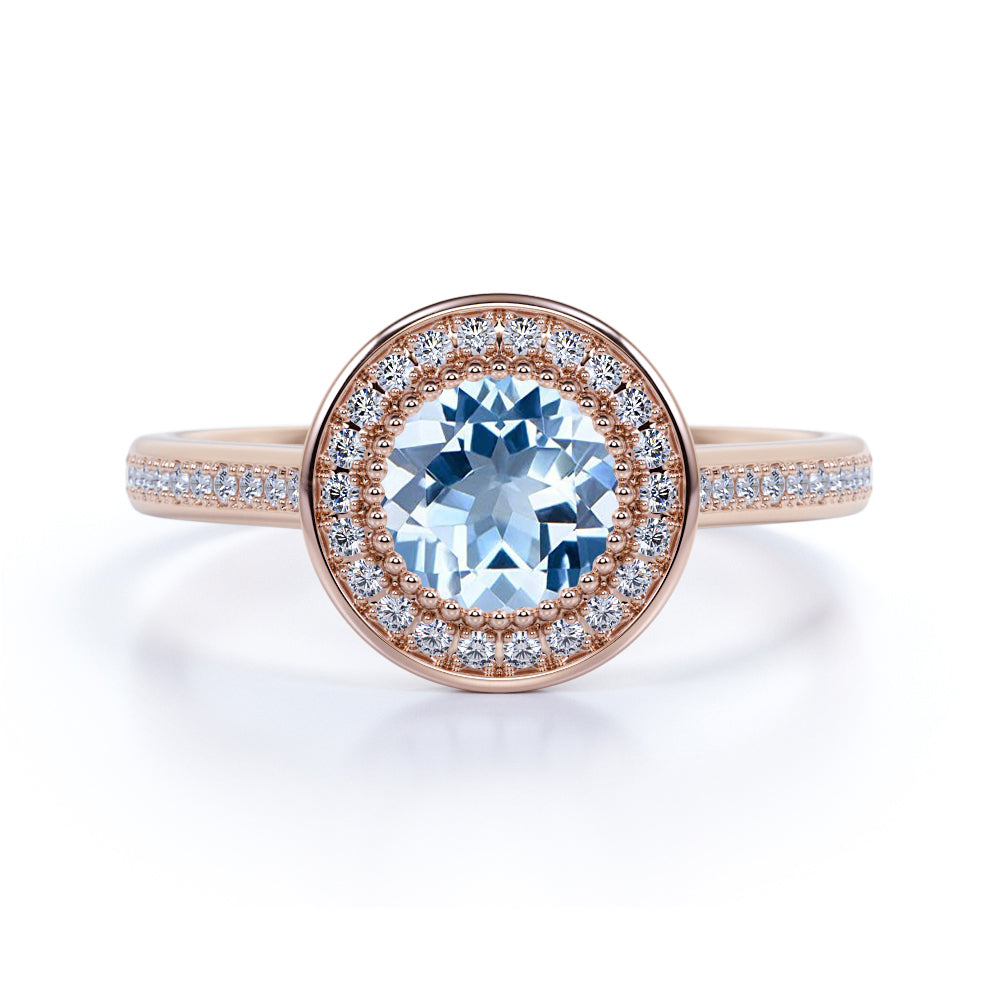 1.25 Carat Round cut Aquamarine and Diamond Halo Engagement Ring in Rose Gold