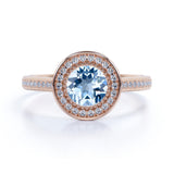 1.25 Carat Round cut Aquamarine and Diamond Halo Engagement Ring in Rose Gold