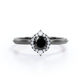 1 carat round cut Black Diamond halo engagement ring in white gold