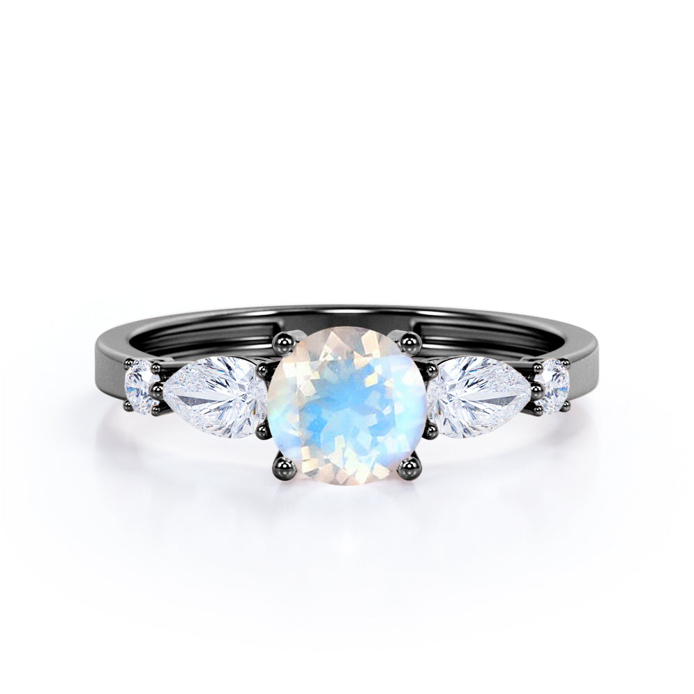 Five Stone Connection 0.6 carat Round Moonstone and Moissanite Engagement Ring in Rose Gold