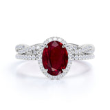 Classic Infinity 1.50 Carat Oval Cut Ruby and Diamond Halo Wedding Set in White Gold
