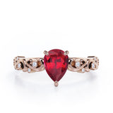 Vintage Style Scroll 0.5 carat Pear Lab Ruby and Diamond Engagement Ring in Rose Gold