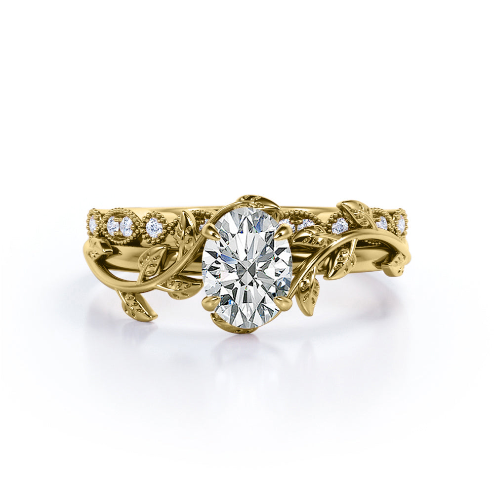 1.25 Carat Oval Cut Moissanite And Diamond Butterfly Style Bridal Set In White Gold