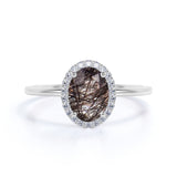 Modern Solitaire 1.25 Carat Oval Cut Natural Druzy Black Brown Rutilated Quartz and Diamond Halo Engagement Ring