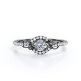 Swirl Halo 1 Carat Round Colorless Moissanite and Diamond French Pave Engagement Ring in Rose Gold