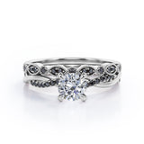 Milgrain Filigree Decorated 1.6 TCW Round Shaped Moissanite with Lab Created Black Diamond Twisted Pave Wedding Set in White Gold