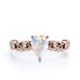 Vintage Style Scroll 0.5 carat Pear Moonstone and Diamond Engagement Ring in Rose Gold