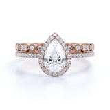 1.75 Carat pear cut Moissanite and Diamond Wedding Ring Set in 10k Rose Gold