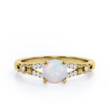 Split Shank 0.6 carat Round Opal and Diamond Engagement Ring in Rose Gold