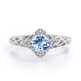 Modern Art Deco 1.10 Carat Round Cut Aquamarine And Diamond Cushion Framed Halo Engagement Ring In Rose Gold