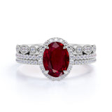 Stylish Vintage Design 2 Carat Oval Cut Lab Ruby and Diamond Halo Trio Wedding Ring Set in White Gold