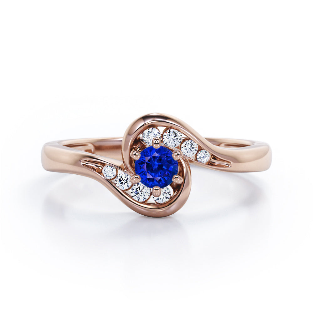 Whirly Gemstone 0.55 carat Round Blue Sapphire and Moissanites Artistic Engagement Ring in White Gold