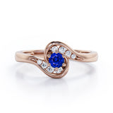 Whirly Gemstone 0.55 carat Round Blue Sapphire and Moissanites Artistic Engagement Ring in White Gold