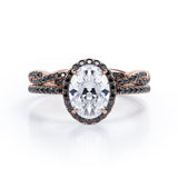 Four-Prong Halo 1.75 TCW Oval-Shaped Moissanite with Lab Created Black Diamond Pave Twisted Eternity Bridal Set in White Gold