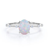 Sharp Four Claws 1.10 Carat Oval Cut Fire Opal And Diamond Seven Stone Engagement Ring In White Gold