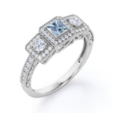 1.5 Carat Princess Cut Aquamarine And Diamond Halo Engagement Ring In White Gold