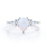 Unique Three Prong 1.35 Carat Tear Drop Precious Fire Opal And Diamond Seven Stone Engagement Ring In Rose Gold