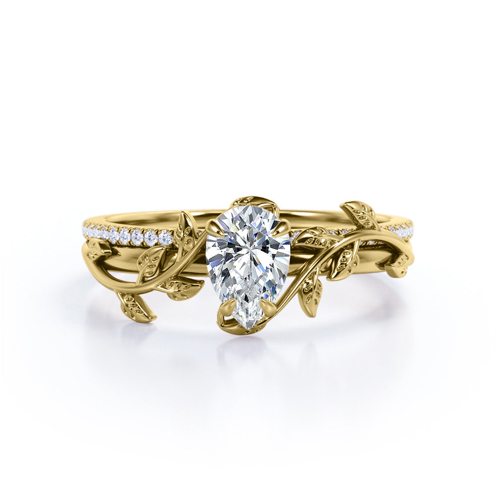 1.25 Carat Pear Cut Moissanite And Diamond Nature Inspired Bridal Set In White Gold