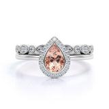 Classic Pave 1.50 Carat Pear Shape Morganite and Diamond Halo Bridal Ring Set with Art Deco Band in White Gold