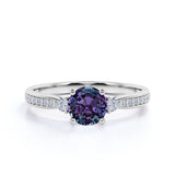 Tapered Prong Basket 1.25 Carat Round Cut Simulated Alexandrite and Diamond 3 Stone Channel Set Engagement Ring