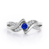 Distorted Unique Twisted Rope 0.6 carat Round Blue Sapphire and Moissanites Promise Ring in White Gold