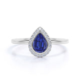 Minimalist 1.20 Carat Pear cut Lab-Created Sapphire and Diamond Halo Engagement Ring in White Gold