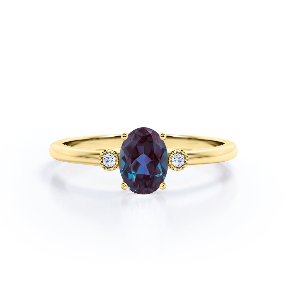 Unique Four Prong 1.10 Carat Oval Cut Lab Created Alexandrite And Diamond Three Stone Engagement Ring In White Gold