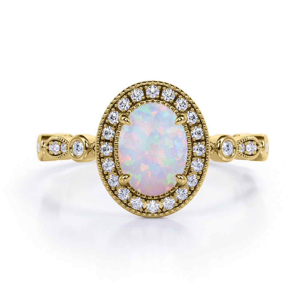 Antique Art Deco 1.35 Carat Oval Cut Ethiopian Opal And Diamond Halo Engagement Ring In White Gold