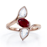 Distorted Line Three Stone 1 carat Oval and Pear Lab Ruby and moissanite Ring in Rose Gold