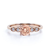 Four Prong Set 1.15 Carat Round Cut Morganite and Four Stone Diamond Engagement Ring in Rose Gold