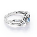 Distorted Unique Twisted Rope 0.6 carat Round Aquamarine and Moissanites Promise Ring in White Gold