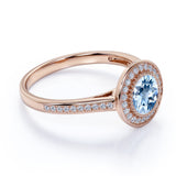 1.25 Carat Round cut Aquamarine and Diamond Halo Engagement Ring in Rose Gold