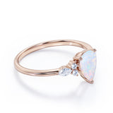 Affordable 1.35 Carat Tear Drop White Opal And Diamond  Seven Stone Engagement Ring In White Gold.