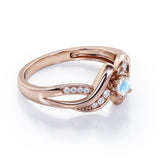 Distorted Unique Twisted Rope 0.6 carat Round Moonstone and Moissanites Promise Ring in Rose Gold
