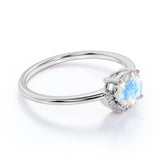 Unique 1.15 Carat Round Blue Flash Moonstone and Diamond Curved Engagement Ring in Rose Gold