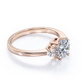 Tapered Classic 0.55 carat Round Moissanite and Diamond Engagement Ring in White Gold