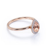 Elegant Pave 1.50 Carat Pear Shape Morganite and Diamond Halo Engagement Ring in White Gold