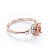 Classic Five Stone 0.6 carat Oval Morganite and Diamond Engagement Ring in Rose Gold
