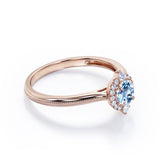 1.15 Carat Round Cut Aquamarine And Diamond Halo Engagement Ring In White Gold