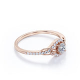 Swirl Halo 1 Carat Round Colorless Moissanite and Diamond French Pave Engagement Ring in Rose Gold