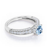 Classic Four Prong 1.45 Carat Round Cut Aquamarine And Diamond Vintage Milgrain Engagement Ring In White Gold