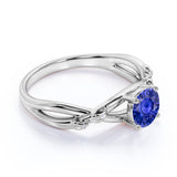 Infinity Inspired 1.25 Carat Round Cut Sapphire and Diamond Engagement Ring in White Gold