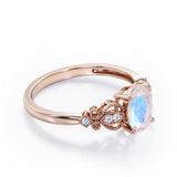 Swirly 0.5 carat Oval Moonstone and Diamonds Antique Engagement Ring in Rose Gold
