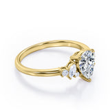 Fashionable 7 Stones 0.6 carat Pear Moissanite and Diamond Engagement Ring in Rose Gold