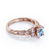 Unique Four Prong 1.15 Carat Round Cut Aquamarine And Diamond Art Deco Engagement Ring In White Gold