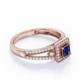 Split-Shanked Pave 1.55 Carat Princess Cut Blue Sapphire and diamond Milgrain-Bordered Halo Engagement Ring in White Gold