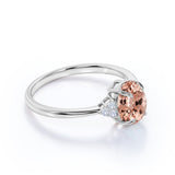Prong Set 1.20 Carat Oval Cut Morganite and Six Stone Diamond Engagement Ring in Rose Gold